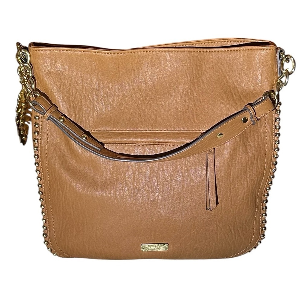 Jessica Simpson hobo style gold studded shoulder bag.Beige in color.